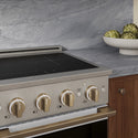 ZLINE Autograph Edition 24 in. 3.2 cu. ft. Marino Induction Range with 3 Element Cooktop and Electric Convection Oven in Satin Stainless Steel with White Matte Door and Champagne Bronze Accents (MINRSZ-WM-24-CB)