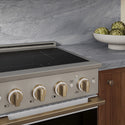 ZLINE Autograph Edition 24 in. 3.2 cu. ft. Marino Induction Range with 3 Element Cooktop and Electric Convection Oven in Stainless Steel with White Matte Door and Champagne Bronze Accents (MINRZ-WM-24-CB)